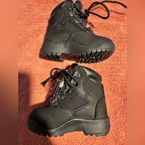 black high top tims boots 5c